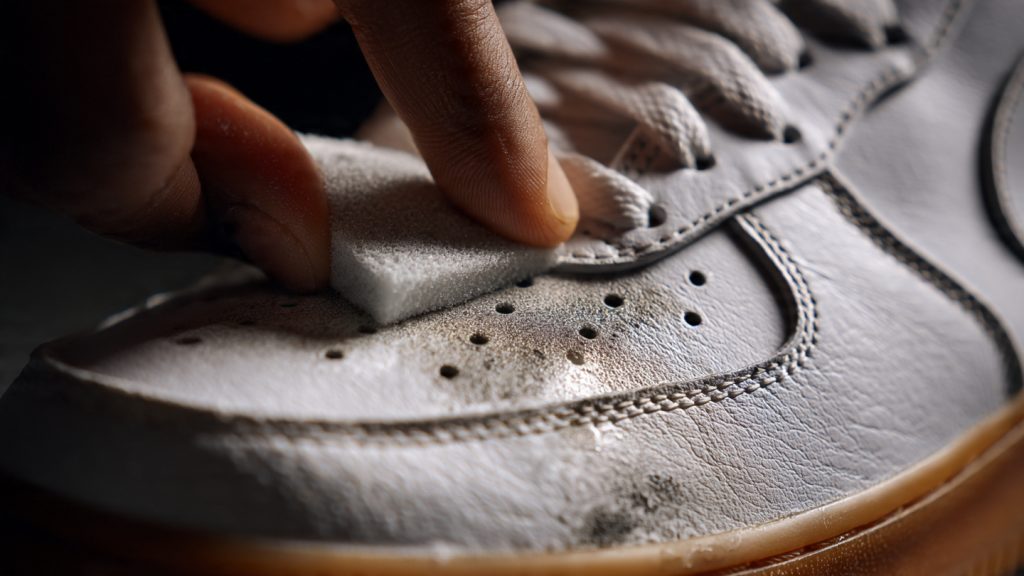 removing scuff mark from white leather sneaker toe box with magic eraser